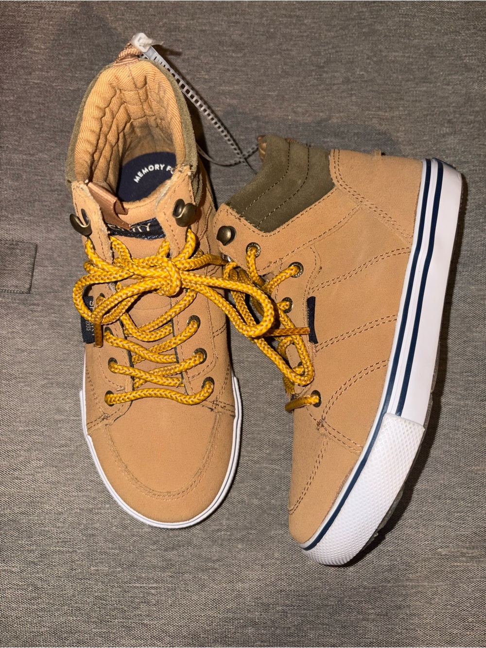 Sperry’s Tan High-Top Sneakers with Yellow Laces